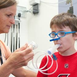 child using spirometer